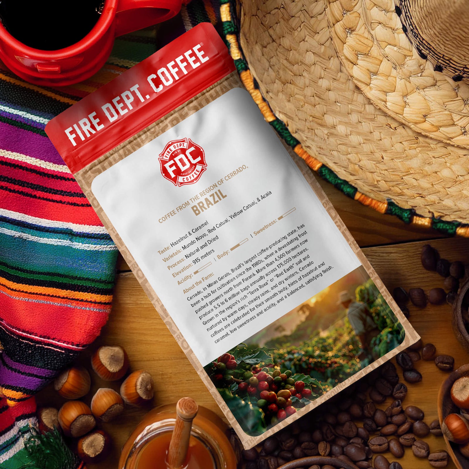 Fire Dept. Coffee package with tasting notes for caramel and hazelnut, featuring a farmer and coffee beans on a white background.