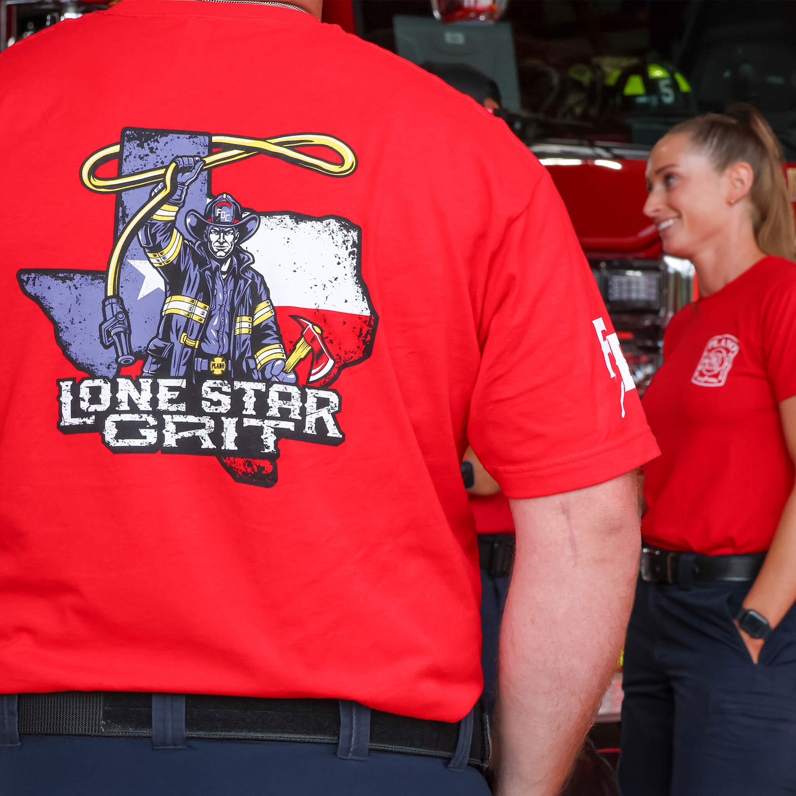 Fire Department Shirt Club Red t-shirt with a graphic design on the back, featuring text and a logo, on a white background.