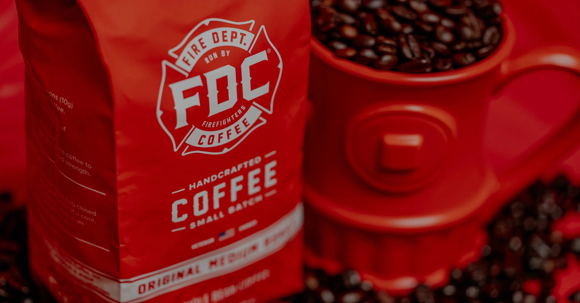 Fire Department Coffee Original Roast Coffee in a bag and inside of a fire hydrant mug.