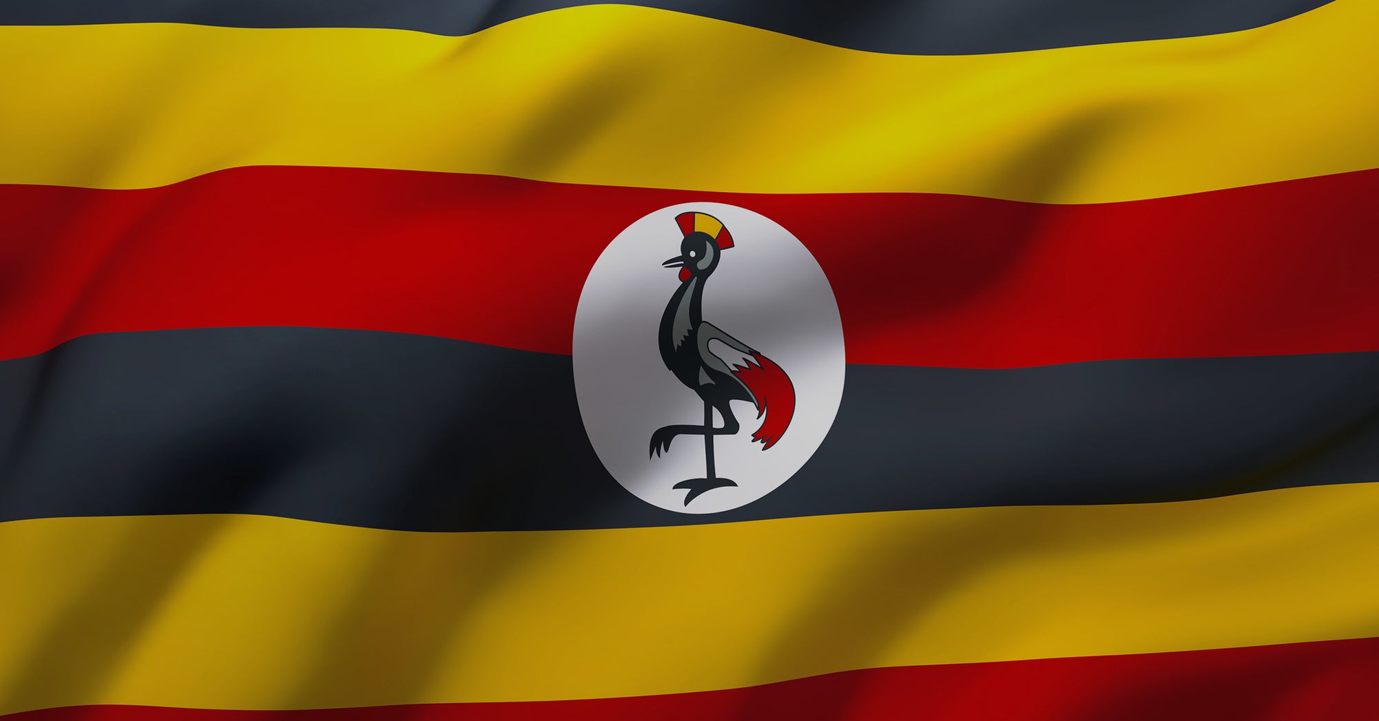 Flag of Uganda waving.