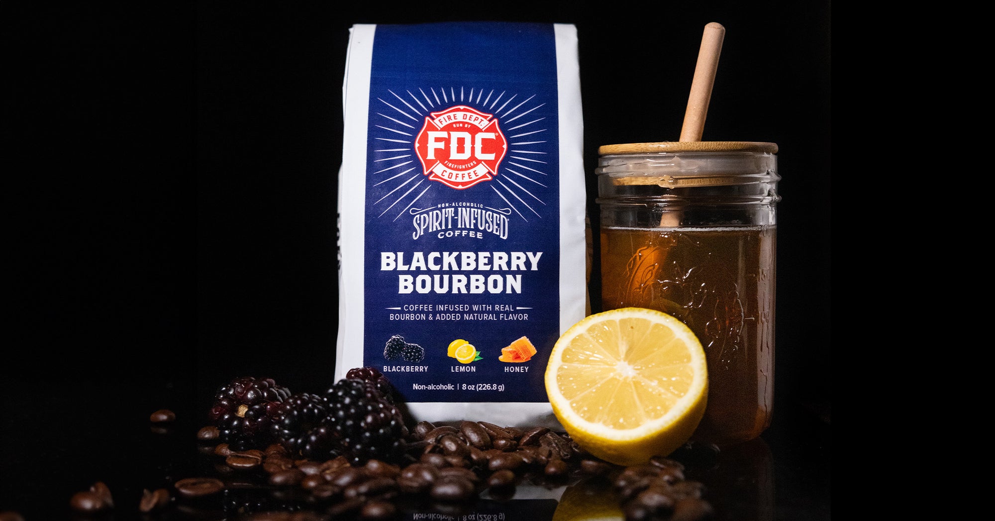 Blackberry Bourbon Infused Coffee featuring a blue bag with tasting notes of blackberry, honey and lemon.