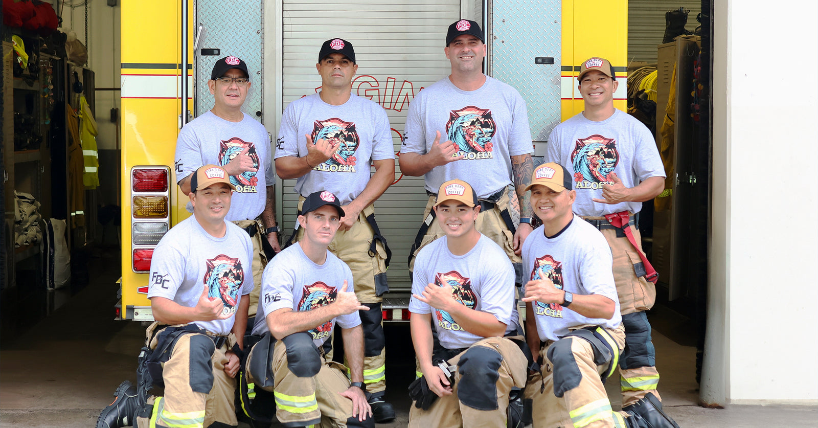 Group of Hawaii firefighters at a fire station.