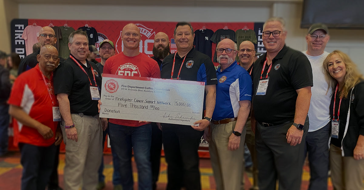 Fire Dept. Coffee Foundation presenting a $5,000 donation check.