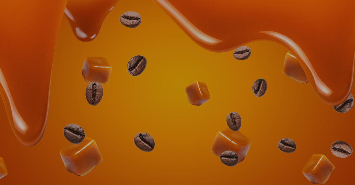 Image of dripping caramel with floating coffee beans and pieces of caramel.