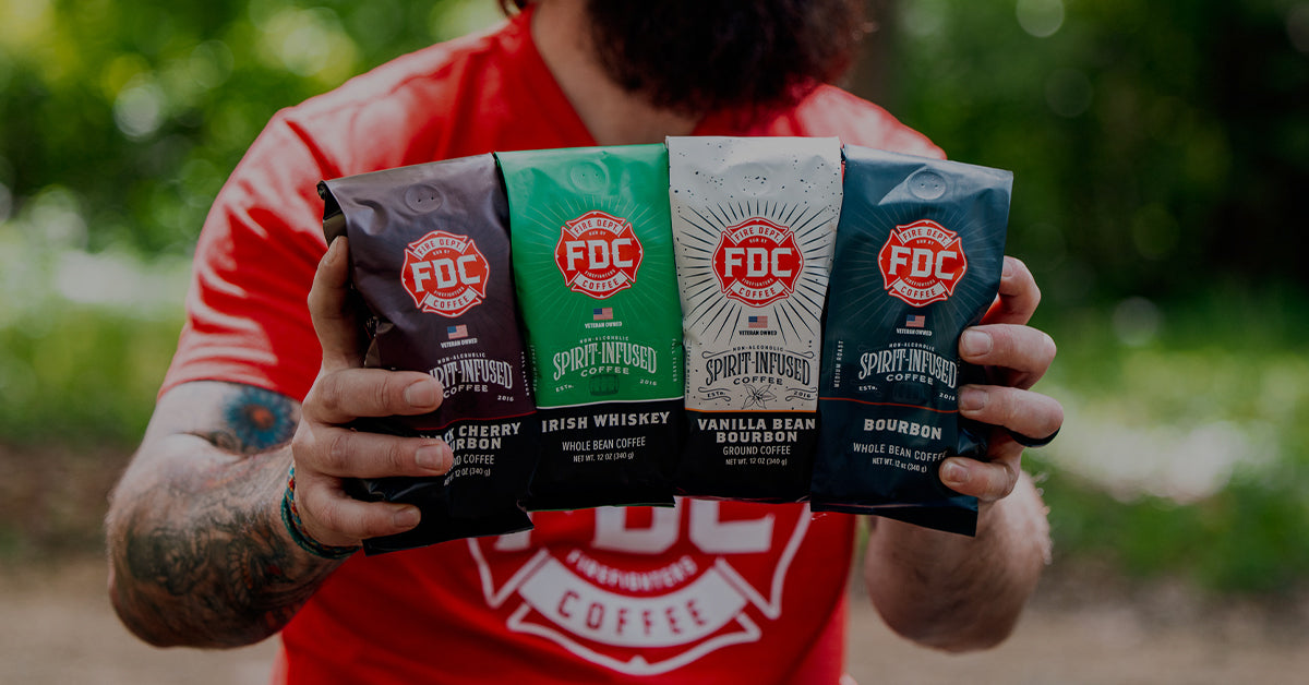 Fire Dept. Coffee's Spirit Infused Coffee Collection in Black Cherry Bourbon Infused, Irish Whiskey Infused, Vanilla Bean Bourbon Infused, and the classic Bourbon Infused Coffee.