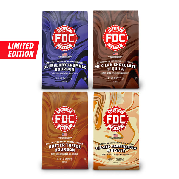 Product grouping showing four coffee bags together. The bags include a bag of Blueberry Crumble Bourbon Infused Coffee, Mexican Chocolate Tequila Infused Coffee, Butter Toffee Bourbon Infused Coffee, and Toasted Marshmallow Whiskey Infused Coffee all set on a white background.