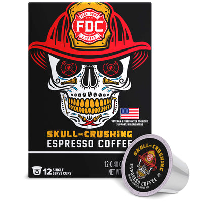 FDC Skull-Crushing Espresso Coffee packaging box with a large skull wearing a firefighter helmet graphic, shown alongside a single coffee pod on a white background.