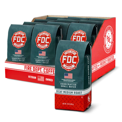 Fire Department Coffee packages in a display box on a white background