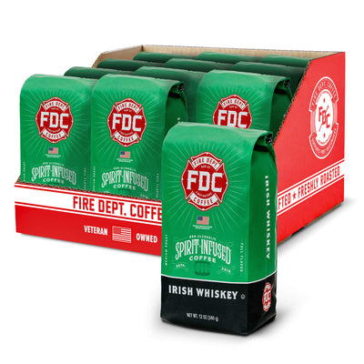 Display of FDC Coffee bags with Irish Whiskey flavor in a red and green packaging.