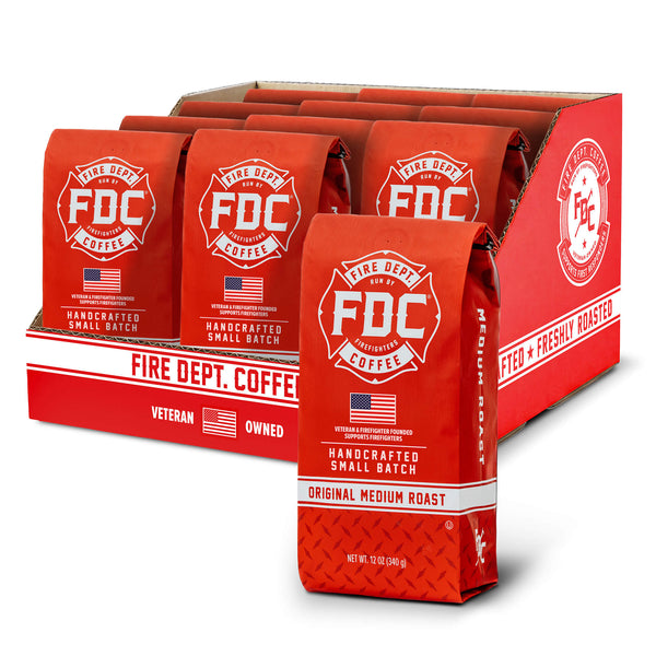 Red coffee bags with FDC Coffee branding on a white background