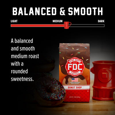A 12 ounce package of Fire Department Coffee's Donut Shop Coffee on a white background.