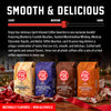 Fire Department Coffee bundle with four 8-ounce bags: Toasted Marshmallow Whiskey, Blueberry Crumble Bourbon, Mexican Chocolate Tequila, and Butter Toffee Bourbon. Naturally flavored, non-alcoholic coffees displayed with holiday gift wrap beneath a “Smooth & Delicious” heading and medium-to-dark roast scale.
