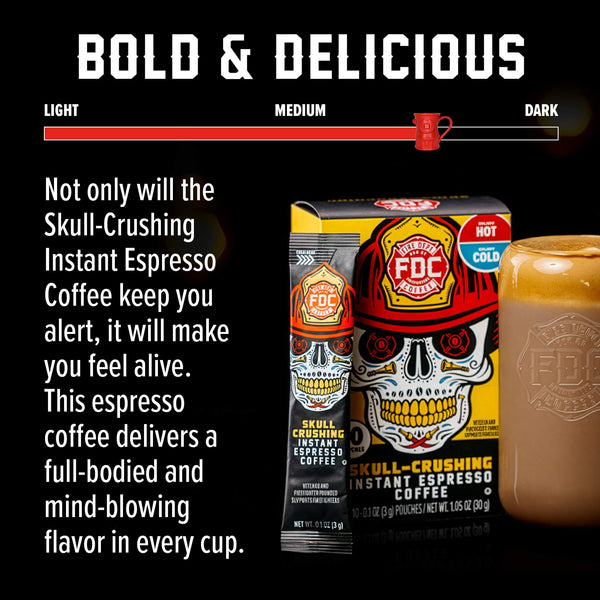 A box and single stick pack of FDC Fire Department Skull-Crushing Instant Espresso Coffee, featuring a graphic of a skull wearing a firefighter helmet on a yellow and black background.