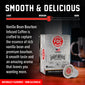 A coffee product advertisement showing a box of FDC Vanilla Bean Bourbon Infused Coffee and a single capsule on a wooden surface, with a coffee mug in the background and a dark gradient backdrop. Large text reads ’SMOOTH & DELICIOUS’ with a light-to-dark coffee strength slider and descriptive copy.