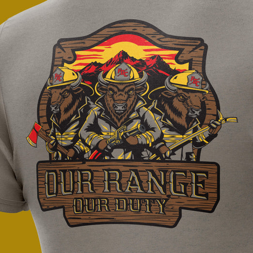 T-shirt with a graphic of three bears in firefighter hats and gear, holding axes, with Our Range Our Duty text on a gray background.