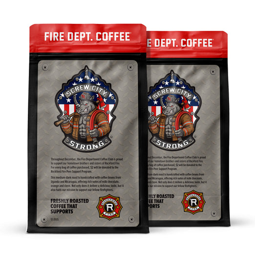 Two packages of Fire Dept. Coffee with a firefighter graphic and ’Screw City Strong’ text on a white background.

