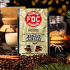 FDC Coffee Eggnog Whiskey package with coffee beans and holiday elements in the background

