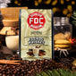 FDC Coffee Eggnog Whiskey package with coffee beans and holiday elements in the background

