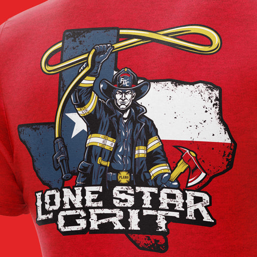 Red t-shirt with a graphic of a firefighter holding a rope, set against a map of Texas, with ’Lone Star Grit’ text.

