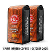 Two packages of FDC Coffee's Pumpkin Rum flavor on a white background

