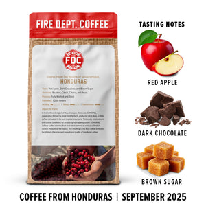 Fire Dept. Coffee package with tasting notes for red apple, dark chocolate, and brown sugar.