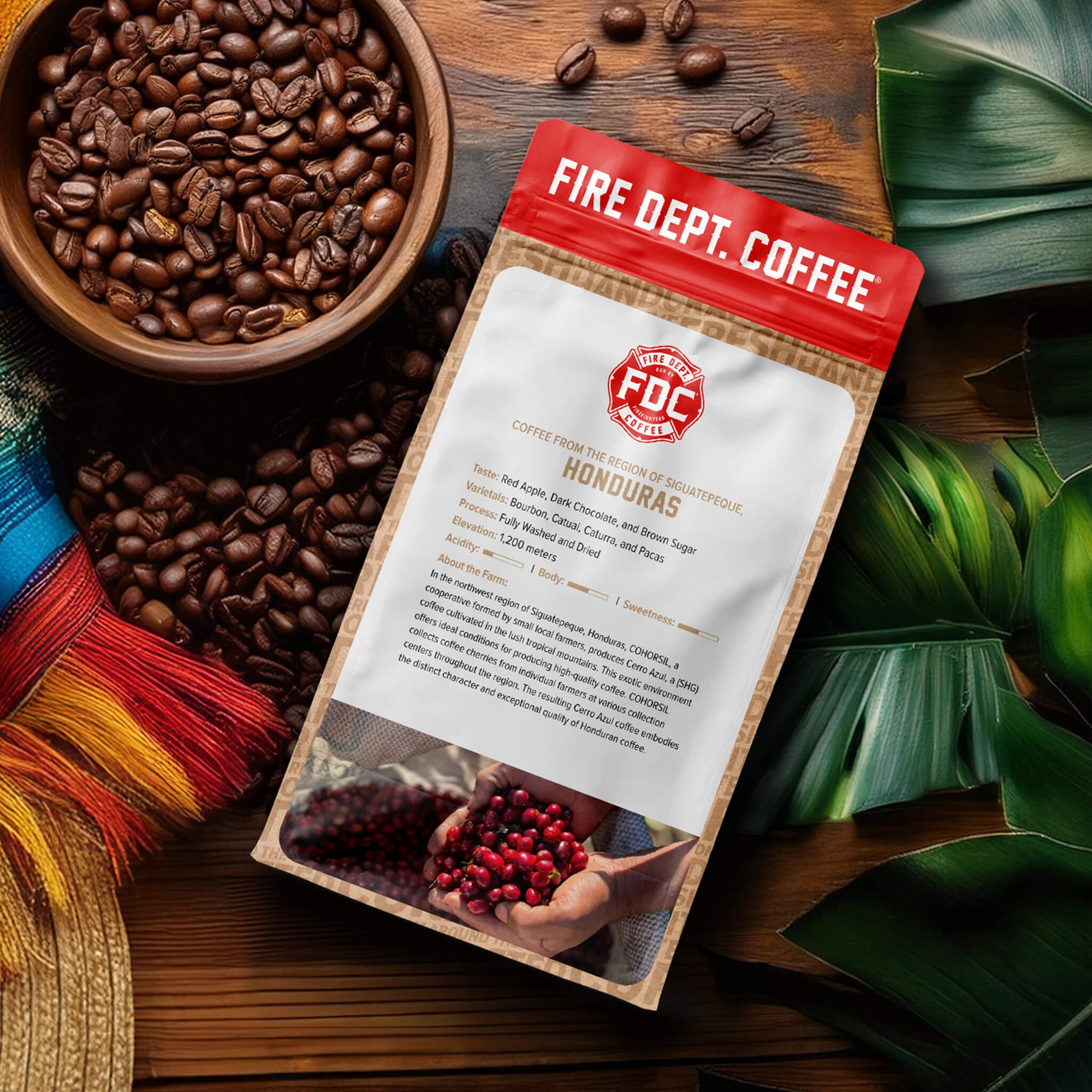 Fire Dept. Coffee package with tasting notes for red apple, dark chocolate, and brown sugar.