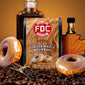 FDC Coffee Glazed Maple Bourbon packaging with donuts and coffee beans on a warm background