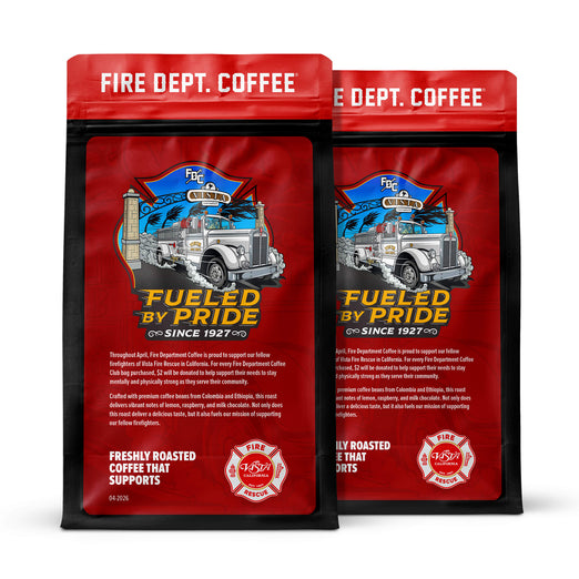 Two red coffee bags with a fire truck design and ’Fire Dept. Coffee’ branding on a white background.