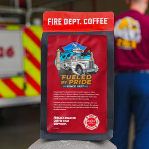 Fire Dept. Coffee package with a fire truck graphic and text on a red background