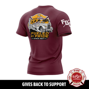 Maroon t-shirt with fire truck graphic and text on a white background