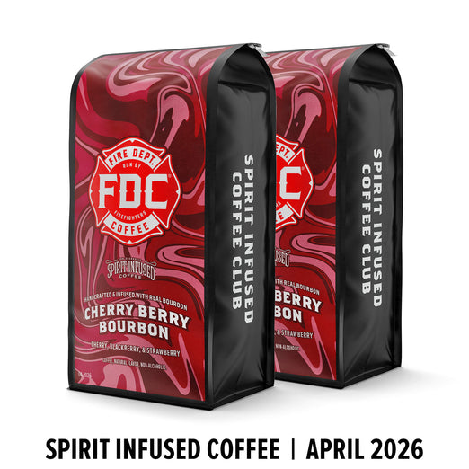 Two packages of FDC Coffee’s Cherry Berry Bourbon coffee on a white background