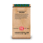 A single stand-up coffee bag with a wood-grain style print and a colorful geometric pattern around the rolled top, shown on a plain white background. Visible text includes ’Coffee from the Region of Mt.
