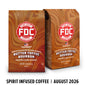 Two bags of FDC Fire Department Approved Coffee in the Butter Toffee Bourbon flavor, shown on a white background with a black text banner at the bottom reading ’SPIRIT INFUSED COFFEE | AUGUST 2026’.