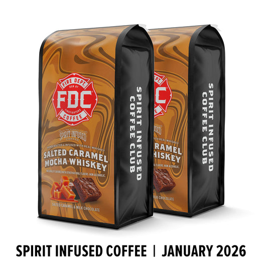 Two bags of FDC Coffee’s Spirit Infused Salted Caramel Mocha Whiskey coffee on a white background.