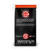 Black coffee bag with red and pink branding on a white background
