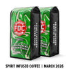 Two green and black coffee bags with FDC Coffee branding on a white background.