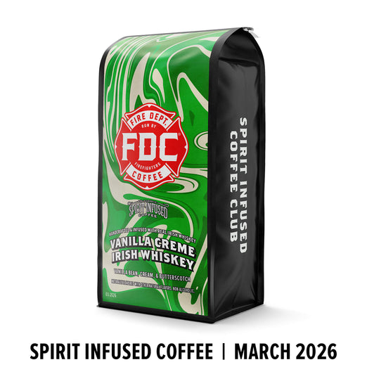 Green coffee bag with FDC Coffee logo and vanilla crème Irish whiskey flavor on a white background.
