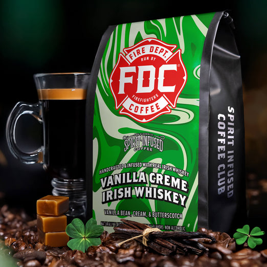 FDC Vanilla Creme Irish Whiskey coffee bag with a glass of coffee and coffee beans on a dark background