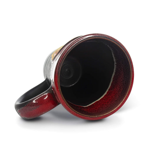 The inside of the Fire Department Coffee Hand Dipped 10 Year Anniversary Pottery Mug with a white background. 