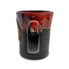 The side of the Fire Department Coffee Hand Dipped 10 Year Anniversary Pottery Mug with a white background. 