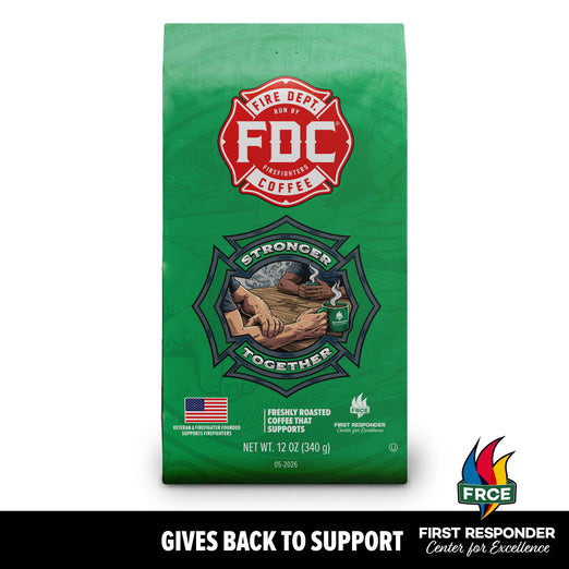 Green bag of Fire Department Coffee with logo and text on a white background