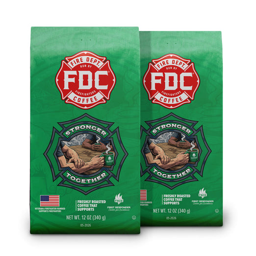 Two green bags of FDC Fire Dept. Coffee on a white background