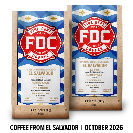 Two bags of FDC Fire Department Coffee from El Salvador, displayed side-by-side against a white background with a black text banner at the bottom reading ’COFFEE FROM EL SALVADOR | OCTOBER 2026’.