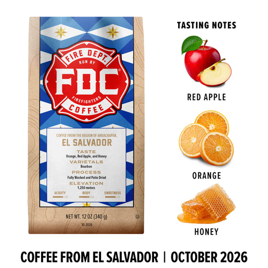 A bag of Fire Department Coffee El Salvador coffee is shown on a white background with flavor notes illustrated on the right: a red apple, orange slices, honey, and text reading ’Tasting Notes’ and ’Coffee from El Salvador | October 2026’.