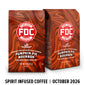 Two bags of FDC Fire Department Bar 911 Coffee in Pumpkin Pie Bourbon flavor, shown on a white background with a black text banner at the bottom reading ’SPIRIT INFUSED COFFEE | OCTOBER 2026’.