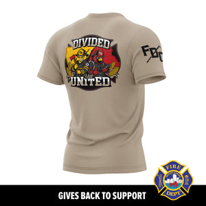 A tan short-sleeve T-shirt shown from the back on a white background, with a large firefighter-themed graphic reading 'DIVIDED BUT UNITED' and a fire department badge on the back, plus partial sleeve text. A black banner at the bottom reads 'GIVES BACK TO SUPPORT' and includes a fire department emblem.