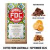 A bag of FDC Fire Department Coffee from Guatemala on a white background, with flavor notes shown on the right: milk chocolate, orange, and brown sugar. Text at the bottom reads 'COFFEE FROM GUATEMALA | SEPTEMBER 2026'.