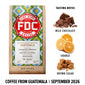 A bag of FDC Fire Department Coffee from Guatemala on a white background, with flavor notes shown on the right: milk chocolate, orange, and brown sugar. Text at the bottom reads ’COFFEE FROM GUATEMALA | SEPTEMBER 2026’.