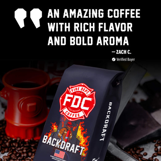 A bag of Backdraft Fire Department Coffee (FDC) is shown prominently in the foreground, with a red coffee mug shaped like a fire hydrant and scattered coffee beans on a dark background. Large promotional text at the top reads, ’AN AMAZING COFFEE WITH RICH FLAVOR AND BOLD AROMA’ attributed to Zach C.