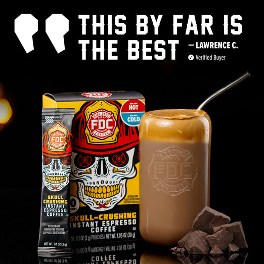 FDC Premium Skull-Crushing Instant Espresso Coffee shown in its packaging alongside a glass of prepared coffee with a metal straw and chocolate chunks, on a black background with promotional text.